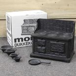 A Morso miniature cast iron stove,