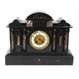 A Victorian black slate mantel clock