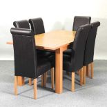 A modern oak extending dining table