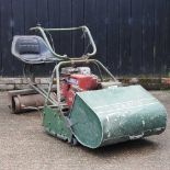 An ATCO 24 inch cylinder lawn mower