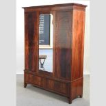 An Edwardian mahogany wardrobe