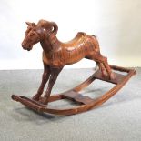 A modern hardwood rocking horse