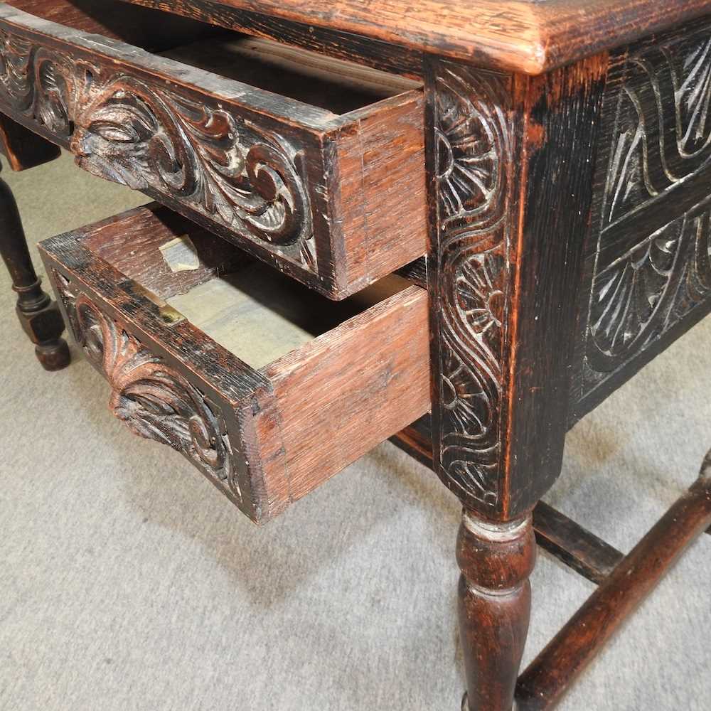 A 19th century carved oak kneehole desk - Image 8 of 8