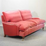 A good quality modern Howard style red velvet upholstered three seat sofa