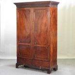 A George III mahogany double wardrobe