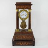 A Napoleon III rosewood and marquetry portico clock