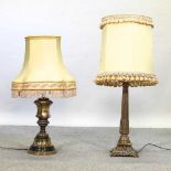 A brass table lamp and shade
