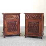 A pair of modern hardwood bedside cabinets