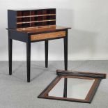 A reproduction French style fruit wood and black painted desk