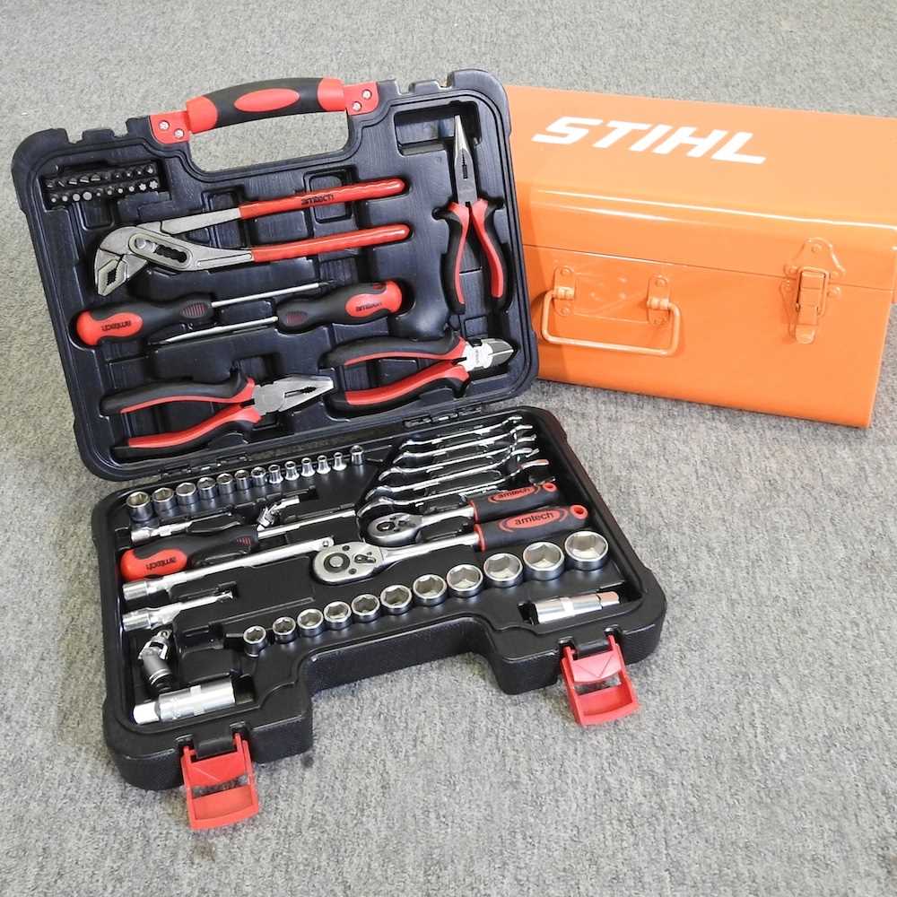 A 65 piece tool kit, together with a toolbox