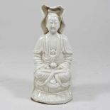 A Chinese blanc de chine pottery Buddha