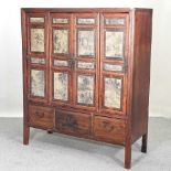 A 20th century Chinese hardwood cabinet