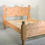 A modern pine bedstead