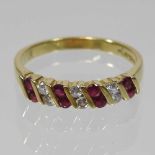 An 18 carat gold, ruby and diamond half-hoop eternity ring