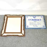 A gilt framed wall mirror