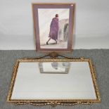 An ornate gilt framed wall mirror