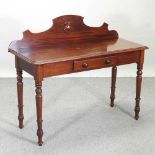 A Victorian mahogany side table