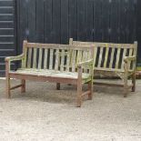 A teak slatted garden bench