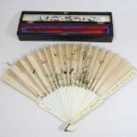 A 19th century Chinese export embroidered fan