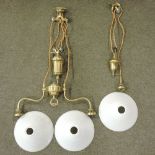 An early 20th century brass adjustable ceiling light