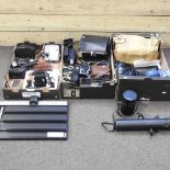 A collection of cameras and accessories