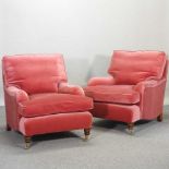 A pair of good quality modern Howard style red velvet upholstered armchairs