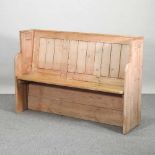 An antique pine pew