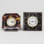 An early 20th century silver and tortoiseshell strut clock