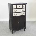 A modern black and white narrow cabinet
