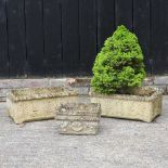 A pair of reconstituted stone troughs