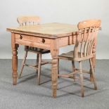 An antique pine kitchen table