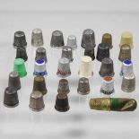 A collection of silver thimbles