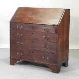 A George III oak bureau