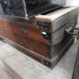 A 19th century iron bound wooden trunk