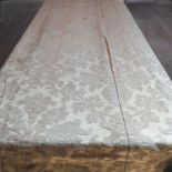 A pair of gold coloured damask floor length curtains