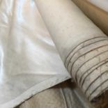 A part roll of white velvet fabric