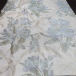 Two pairs of floor length blue floral curtains