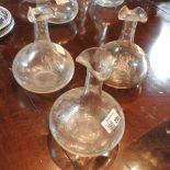 A set of three early 20th century glass hand blown decanters