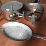 A batterie of six Victorian copper saucepans