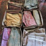 Six boxes of vintage textiles