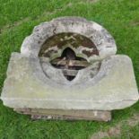 A carved stone window frame