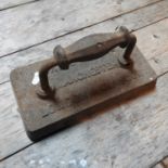 A 19th century cast iron billiard table smoothing iron