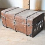 A 19th century wooden bound travel trunk