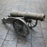 A cast metal model of a cannon