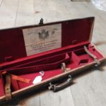 An early 20th century leather gun case by Holland & Holland