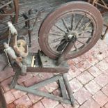 A 19th century wooden spinning wheel