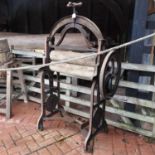 An unusual Victorian cast iron and wooden mangle