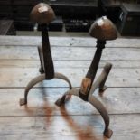 A pair of 19th century wrought iron and brass fire dogs