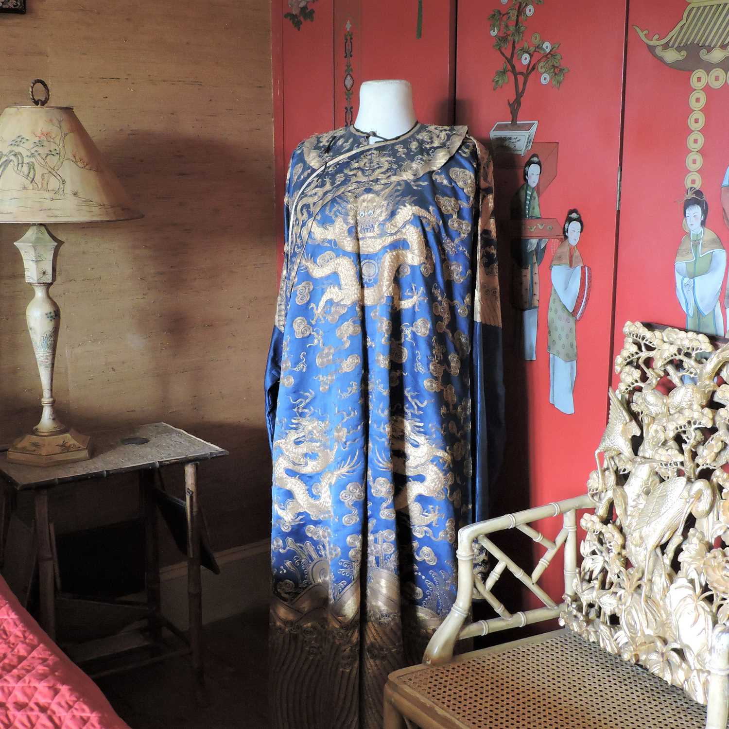 A Chinese blue silk sleeved robe