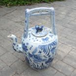 A large blue and white Chinese teapot and cover